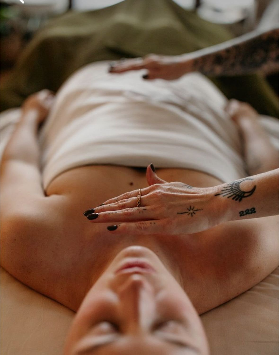 Priscilla facilitating a Reiki energy healing session.